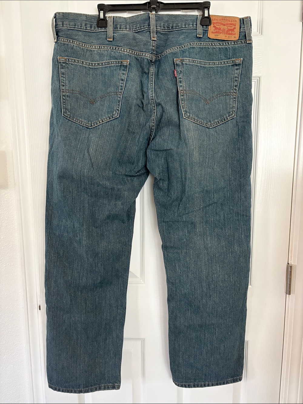 Levi's Men's Straight Jeans in Faded Blue Denim